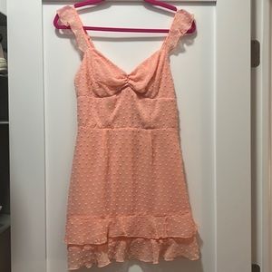 Lucy in the sky, coral ruffled mini dress